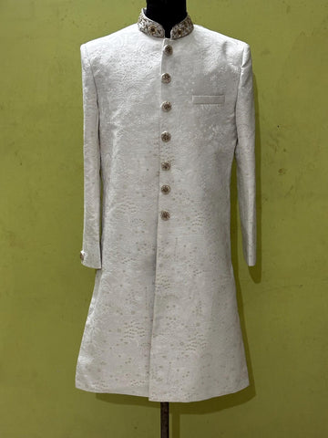 Madhu Couture Groom White Self Design Wedding Sherwani Indian Stylish Ethnic Traditional Partywear Marriage Indian Outfit For Men.